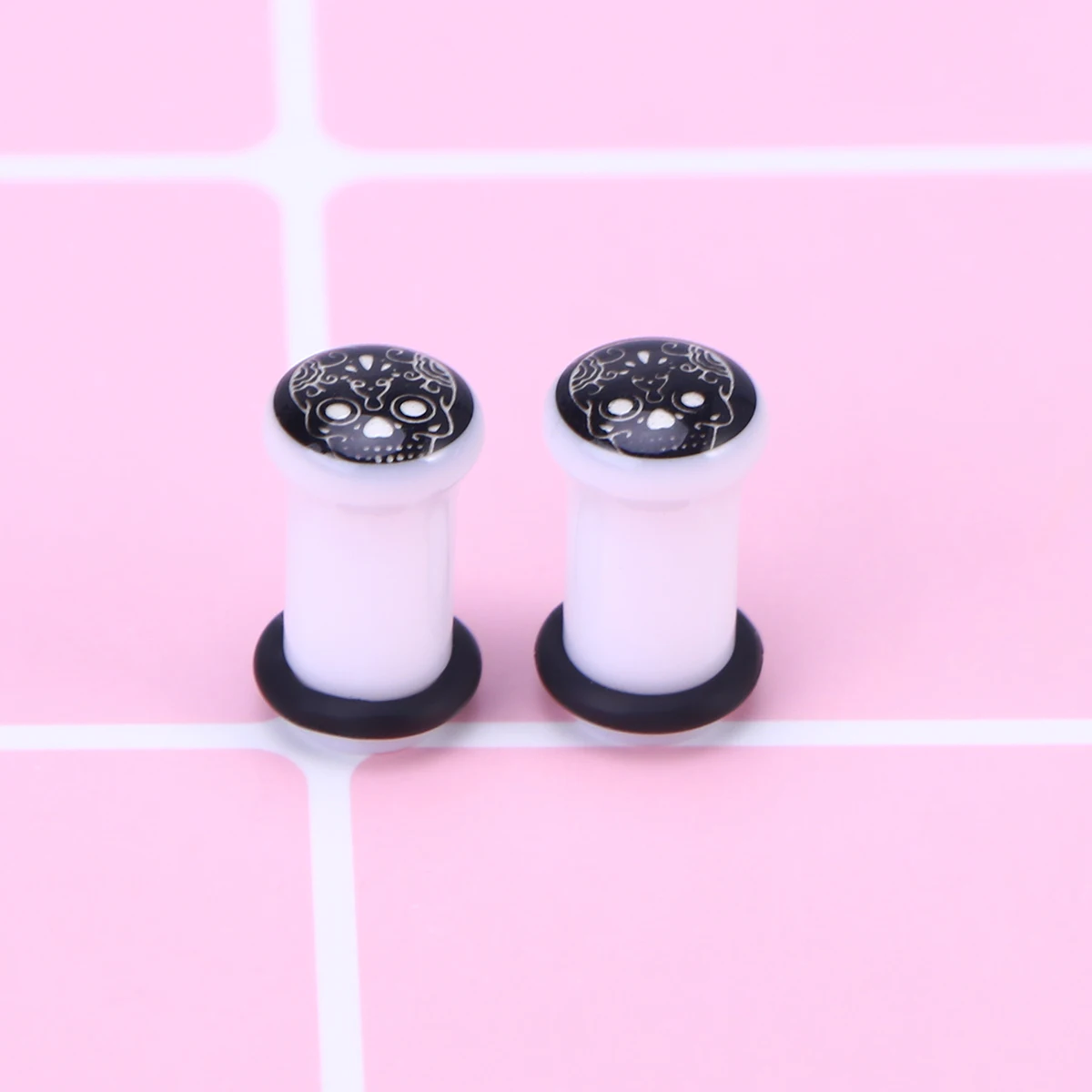 

1Pair 12mm Acrylic Luminous Skull Head Ear Plugs Easy to Match Overall Look High Quality Comfortable for Wearing