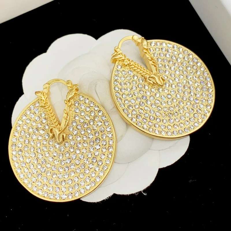 2025 new high quality AAA fashion light luxury glossy earrings exaggerated European and American jewelry female gift wholesale