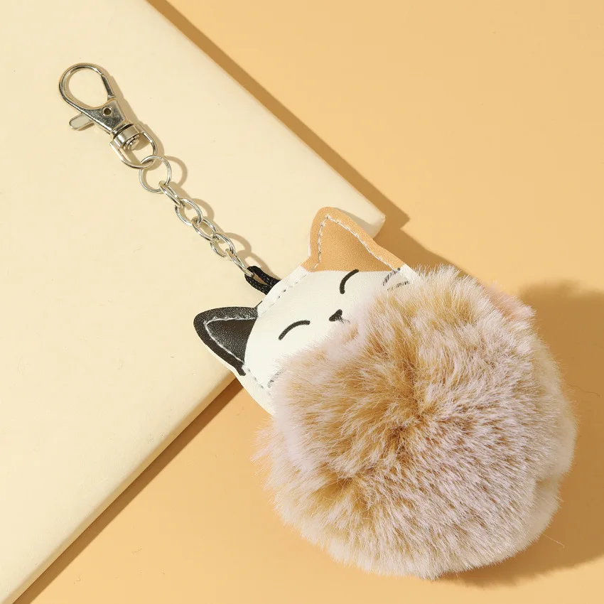 New Cute Plush Cat Hairball Keychain Simple and Versatile Leather Lucky Cat Car Bag Pendant Gift Wholesale