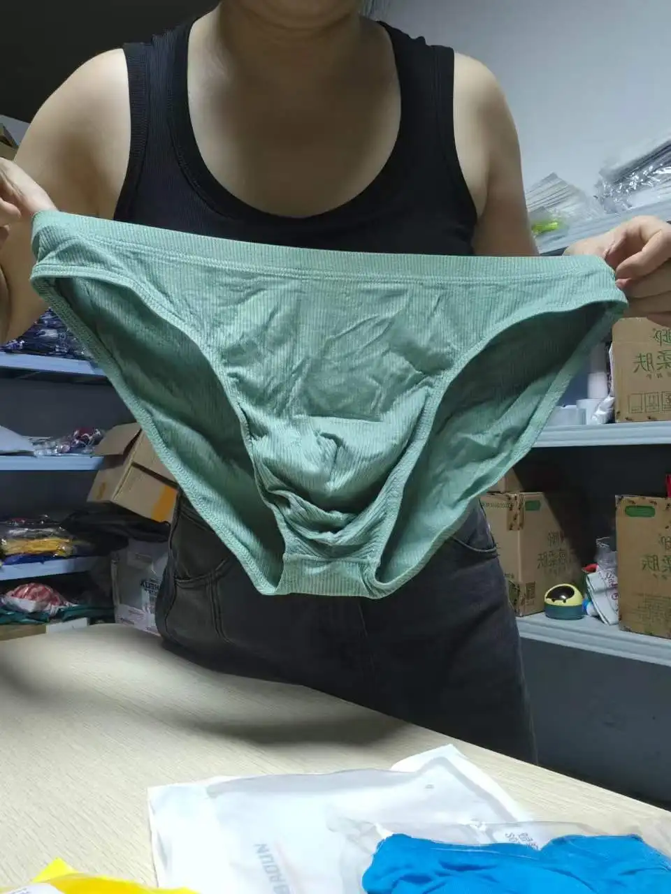 2026wholesale foreign trade men's one-piece low waist triangle breathable youth underwear solid color loose pants 2024