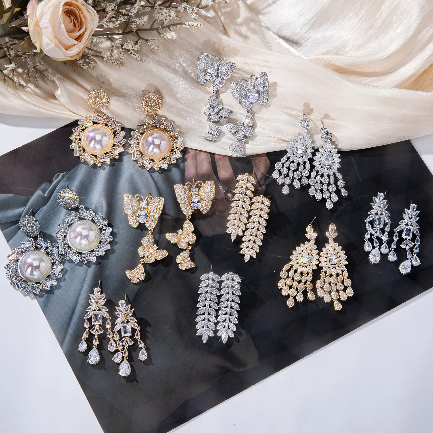 2025 new full diamond wheat ear temperament high-end earrings women's niche alloy earrings, claw chain light national style earr
