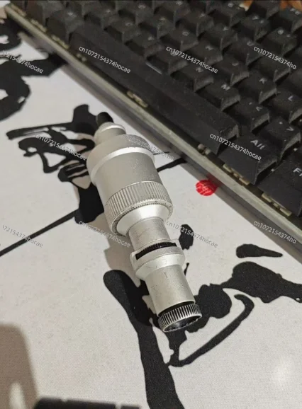 Used 2008-50x/2008-100X magnifying glass with scale, measuring range of 1.6mm, accuracy of 0.02mm, transparent lens, no base