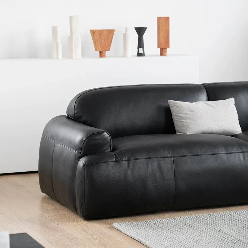 Retro first-layer cowhide small apartment sofa, living room bread Italian minimalist straight row three-person black sofa