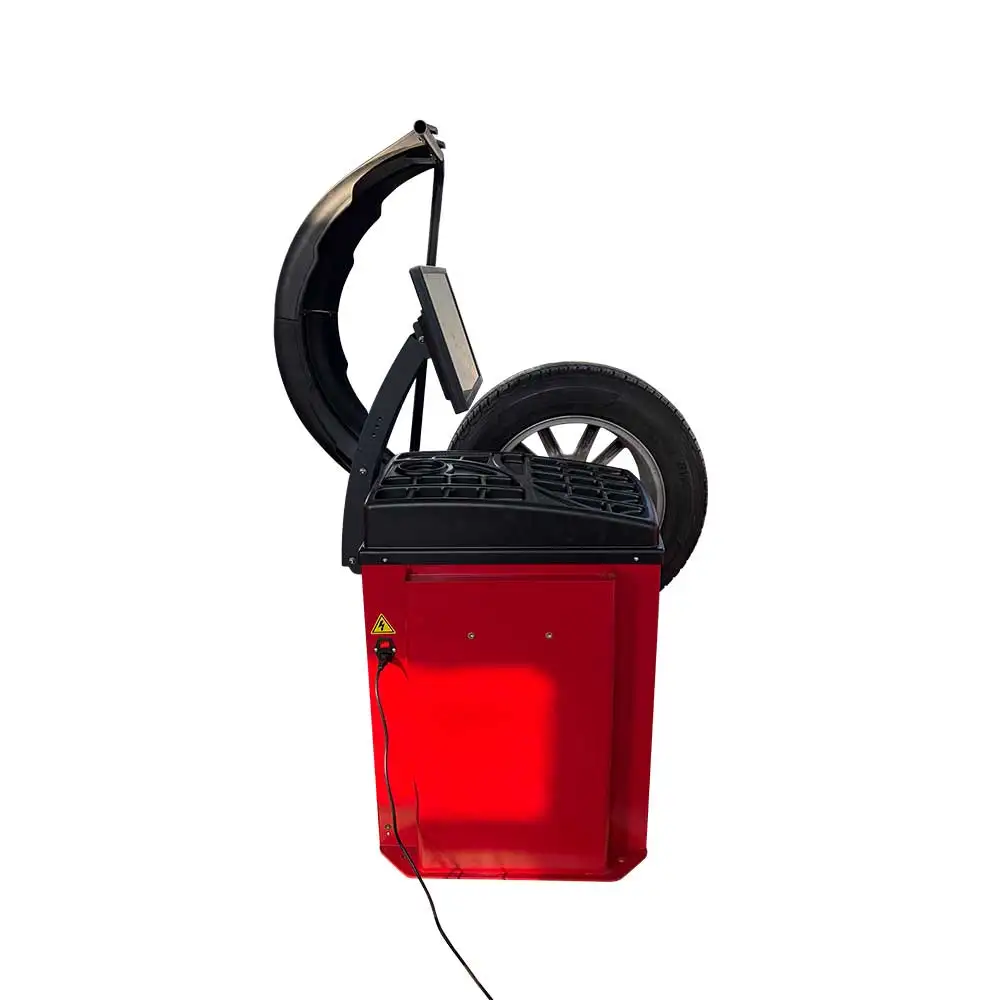 Professional Car Repair Wheel Balancer with 1g Precision 140rpm Speed 0.90KW Power 110V/220V/380V Compatible CE ISO Certified