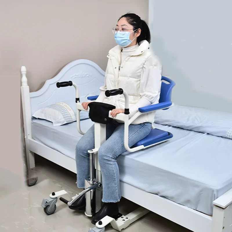 La sedia di trasferimento manuale dell'ascensore della sedia a rotelle sposta l'ascensore del paziente e la sedia di trasferimento per Eldery