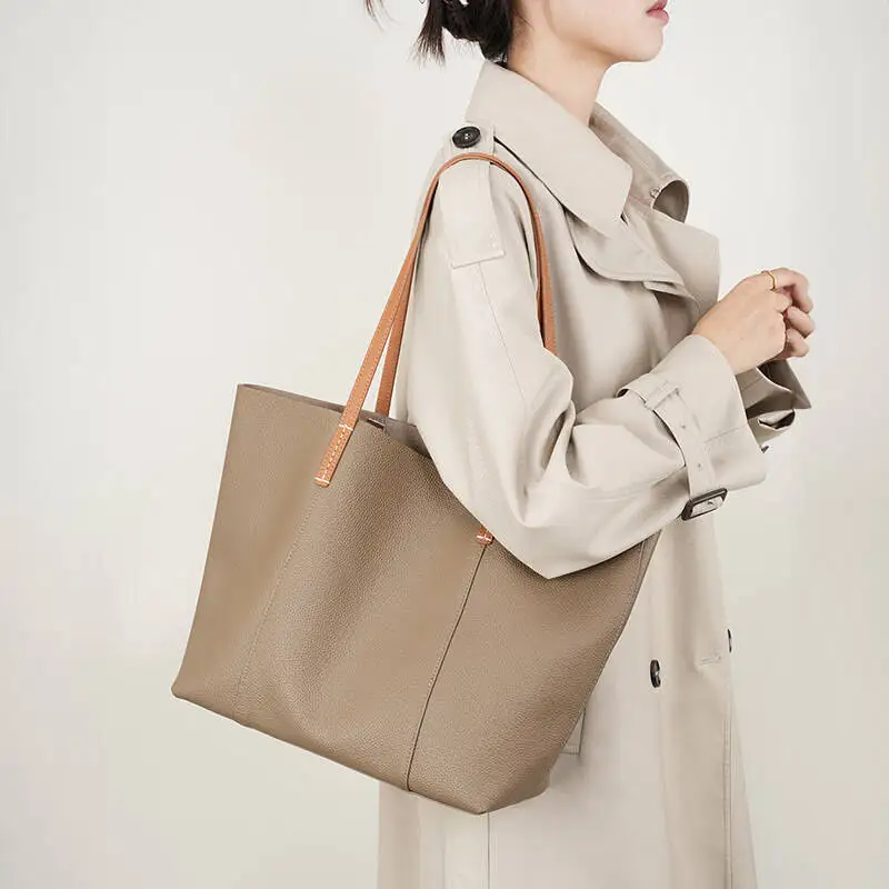 

Women's 2026 New Model New High Quality Wing Bag Shoulder Hand-held Armpit Tote Bag Cowhide Bucket Large Capacity Leather Bag