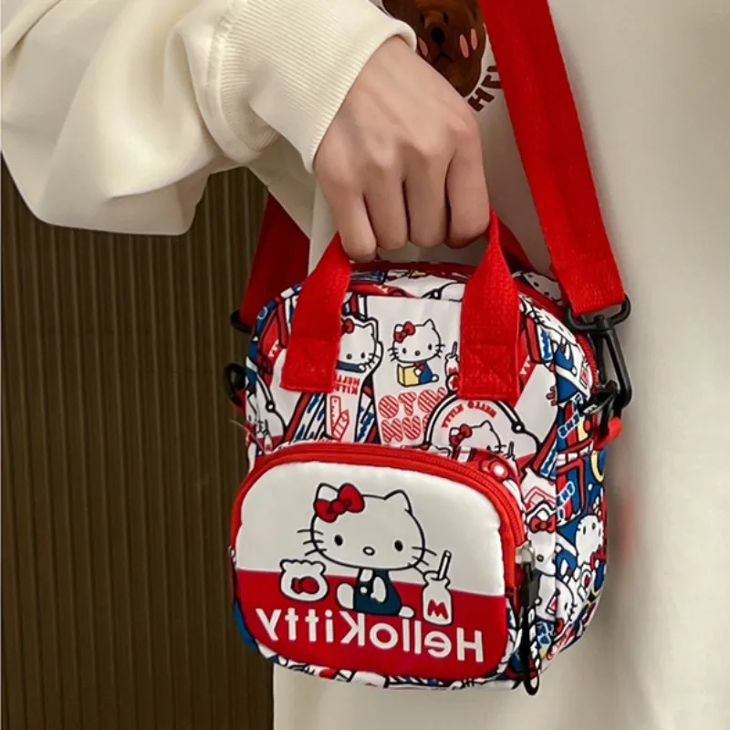 MBTI Hello Kitty torba na ramię damska mała styl japoński moda nadruk kreskówkowy torba Crossbody nylonowa śliczna damska torebka na monety