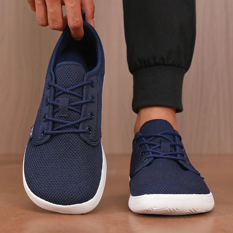 Scarpe da uomo Sneakers Punta larga A piedi nudi Casual Larga Ultima tela alla moda Scarpe piatte nere Scarpe da uomo in mesh traspirante
