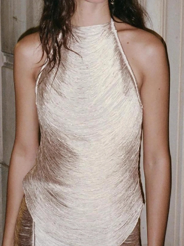 

2026 New Casual Backless Beach Tops Ladies Sexy Hanging Neck Hollow Out Slim Blouses Summer Tassel Solid Color Club Party Tees