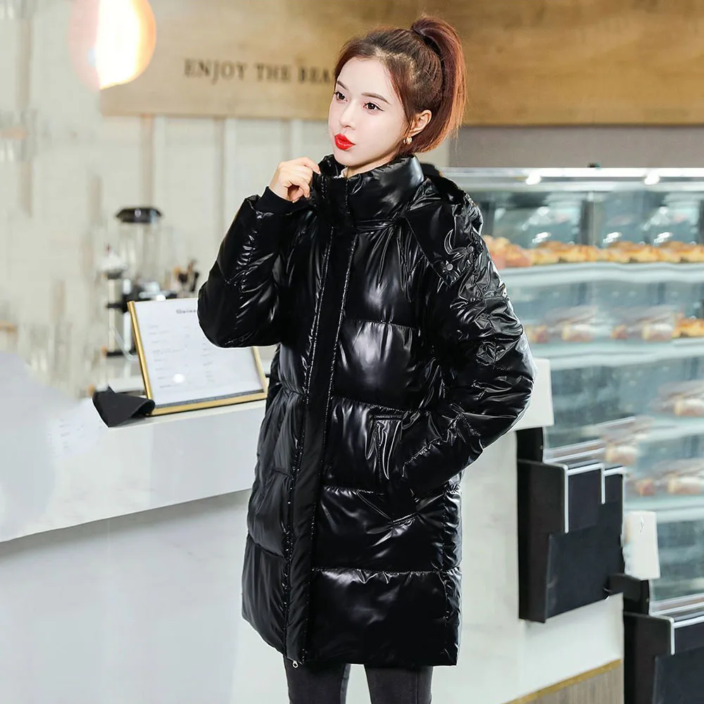 Daunen Baumwolle gepolsterte Jacke Mädchen lange lose Kapuze Mode westlichen Stil koreanischen Winter warm lange Baumwolle gepolsterte Jacke Mantel.