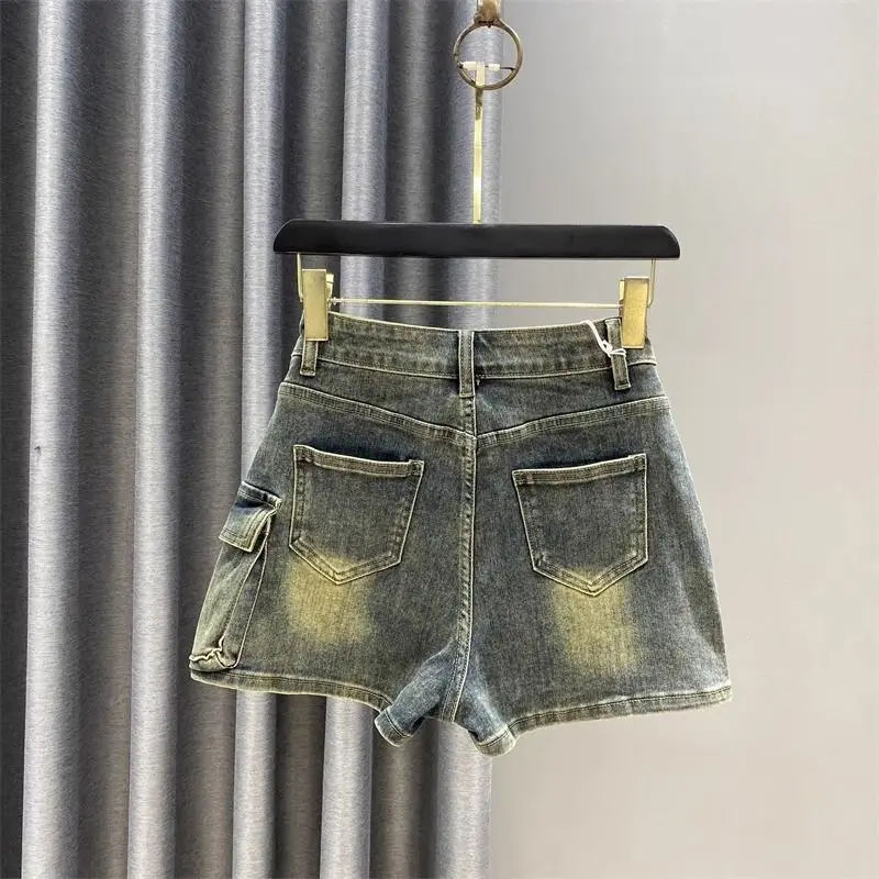 Design Sense Jeans gonna da lavoro per donna 2024 New High Waist Retro Spicy Girl A Bag Hip Short Pants