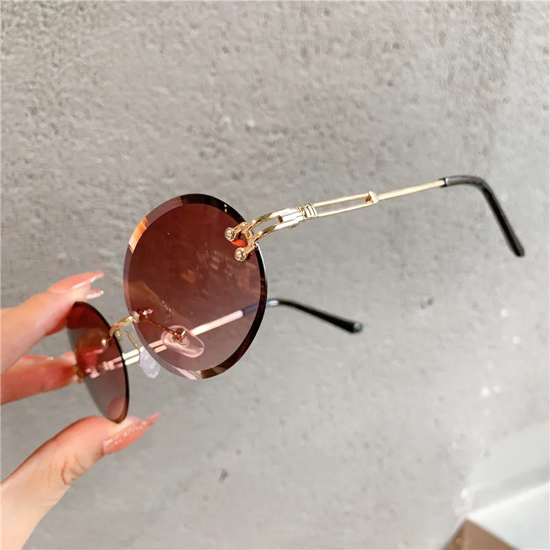 

Trendy Sunglasses for Woman Summer Rimless Cut-edge Sunglass Oval Fashion Brand Designer Shades Pink Women's Sun Glasses UV400