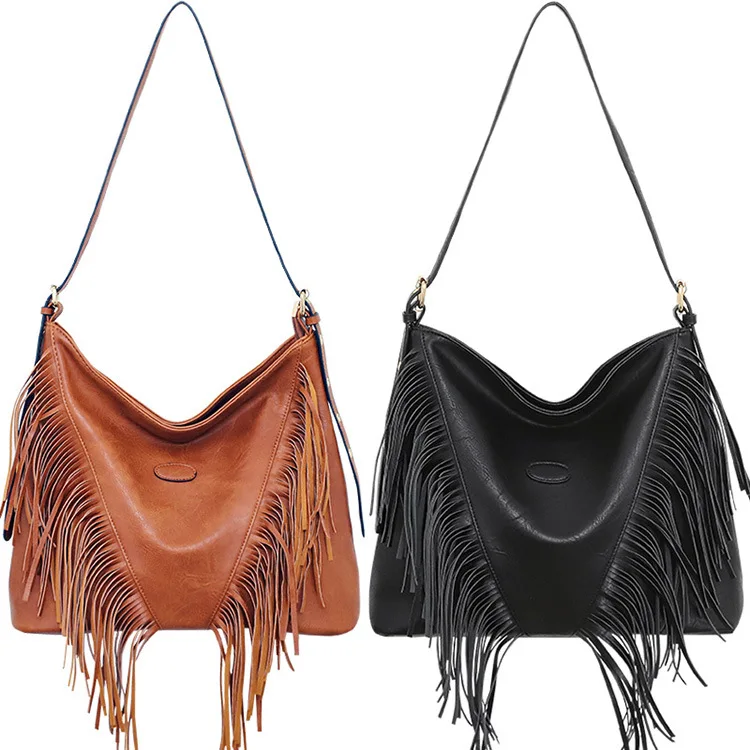 

European and American casual large capacity rivet shoulder bag hand-carried tassel bag trendy women's bucket bag