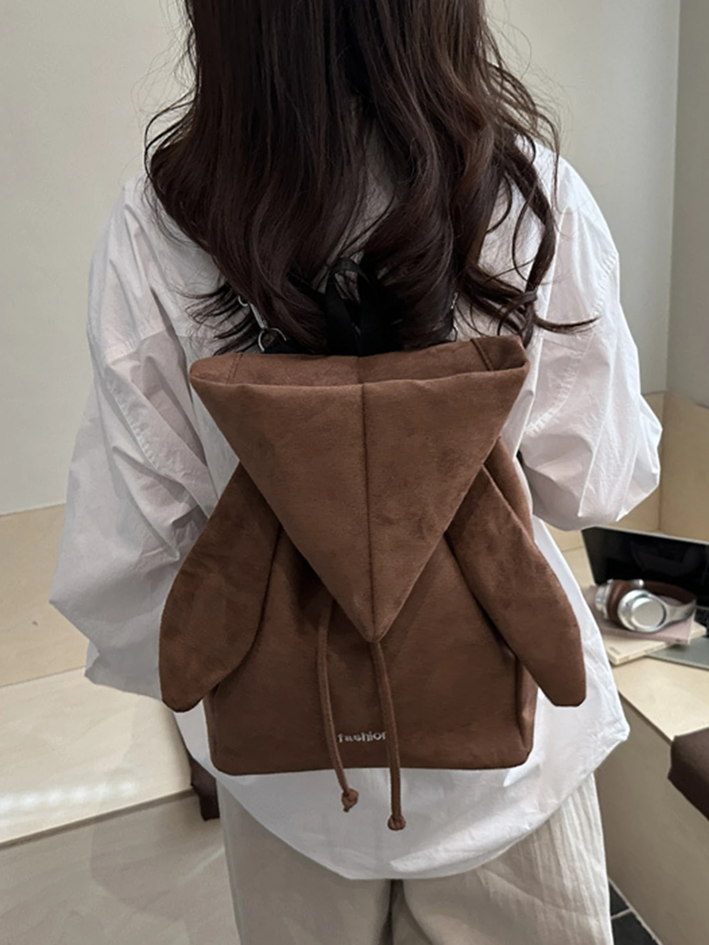2026 New Angel Wings Backpack Simple High Value Drawstring Hoodie Cap Bag Small  Style Youth Casual Commuter Bag