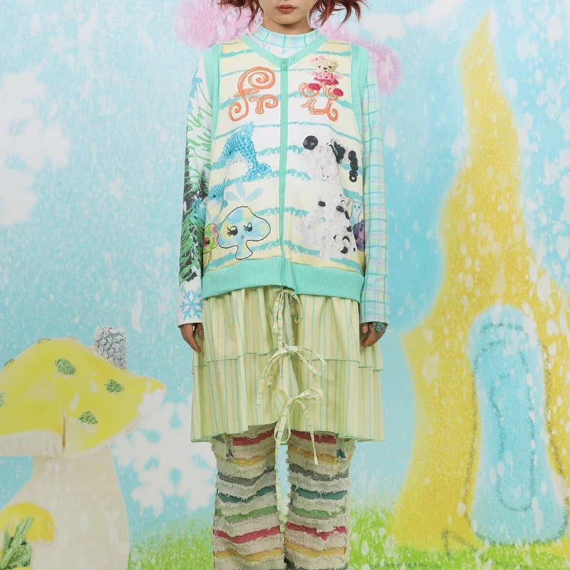 日本の女性の服春と秋のオリジナルデザインのドレス漫画の印刷スプライシングニット黄緑の弓ベストドレス