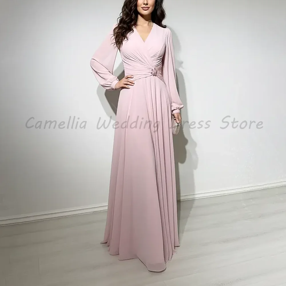 

Blush Pink V-Neck Long Sleeve Chiffon Evening Gown Ruched Waist with Rhinestone Detail A-Line Formal Maxi Dress