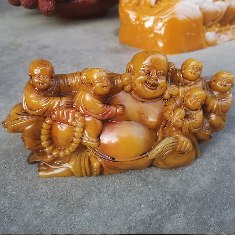 Natural hibiscus stone, Laotian Huangshi, Wuzi Dengke ornaments hugging big Buddha hugging stone