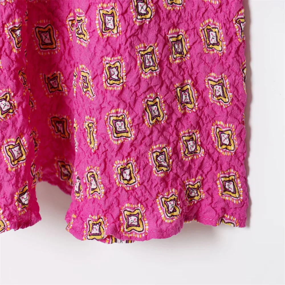 بلوزة نسائية صيفية جديدة لقضاء العطلات على شكل قرص العسل مطبوعة برقبة على شكل حرف V بدون أكمام وتنورة ميدي عالية الخصر