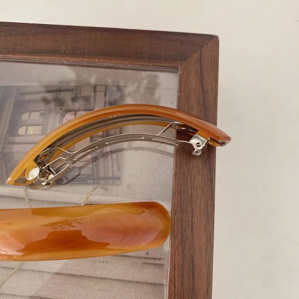 Fermaglio per capelli creativo ellittico con stampa leopardata Clip a molla ad arco in PVC Clip per afferrare Copricapo Grande forcina per ragazza