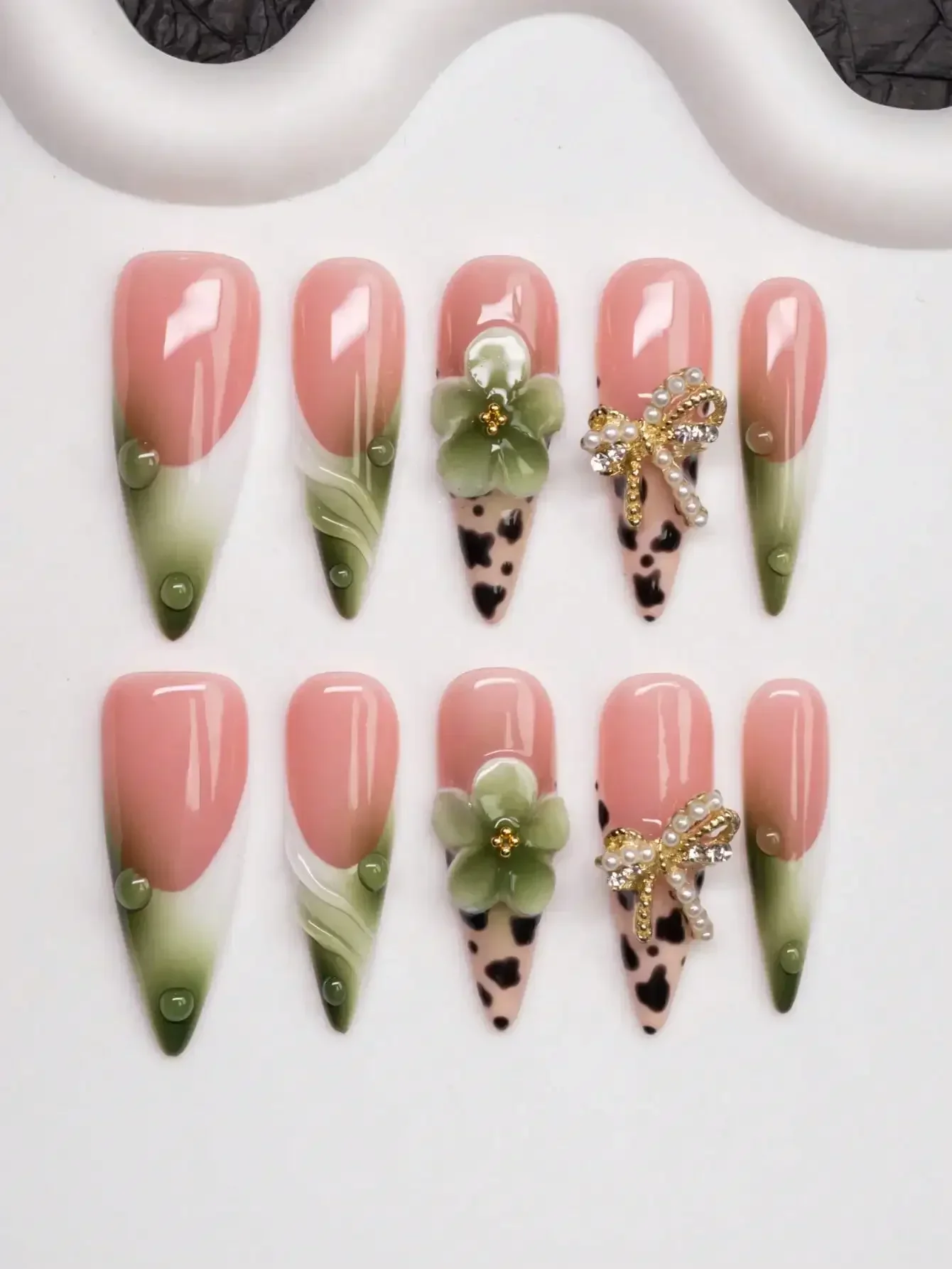 

Handmade Almond-Shaped Press-On Nails With Y2K Baddie Style, Featuring Nude, Green, And White Nail Plates With Cream Tip, Tie Dy
