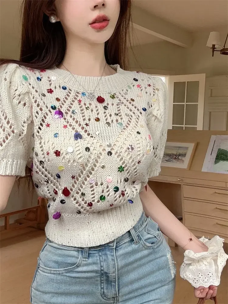 Gagarich 2024 Summer New Sparkling Short Sleeved Knitted Shirt French Sweetheart Hollow Out Design Unique Short Pullover Top