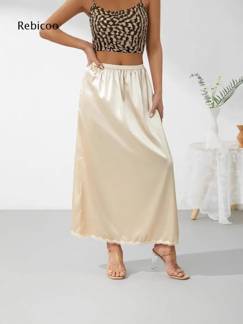 Ladies Flowy Satin Mid Length Skirt Featuring Lace Trim Hem For Leisure Parties And Multiple Elegant Outfit Combinations