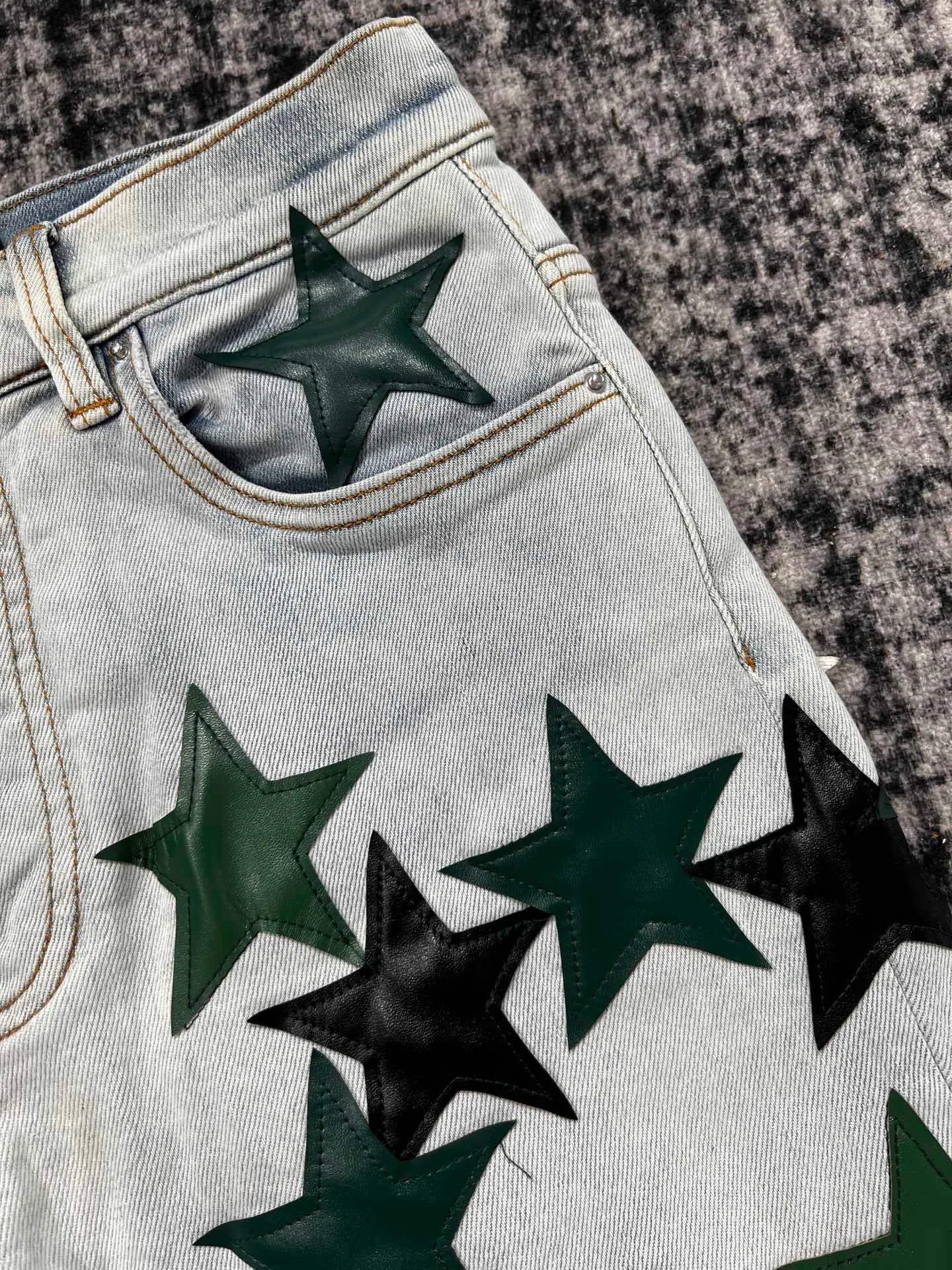 men allover green star patches distressed jeans