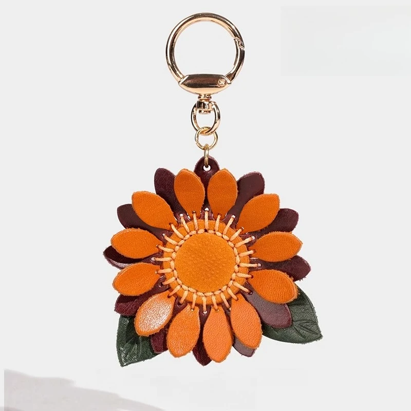

Handmade genuine leather sunflower keychain decoration vegetable tanned leather bag charm cute and trendy gift