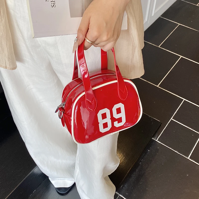 

Модные сумки через плечо из лакированной искусственной кожи, новая сумка для девочек с короткой ручкой, сумка для боулинга на молнии, маленькие сумки Boston со спортивным дизайном