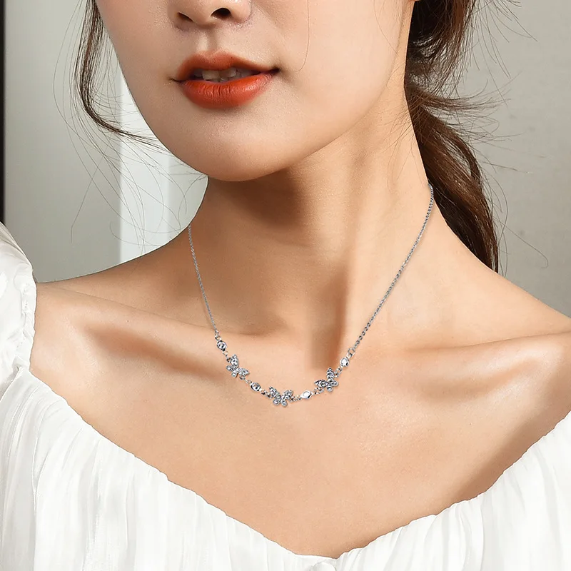 A brand-new simple three-butterfly single-layer collarbone chain necklace exudes a sweet feminine charm