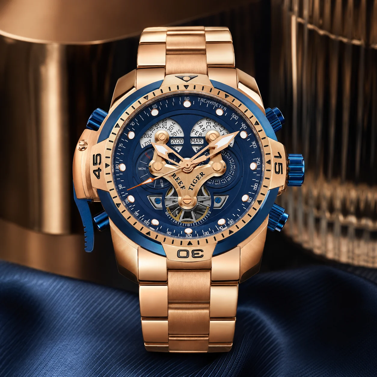 Reef Tiger Men's Automatic Sports Watch, featuring luminous hands and markers, a sapphire crystal, and water resistance.