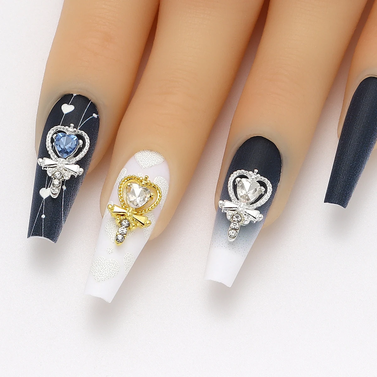 

100pcs of 3D nail art jewelry, gold and silver alloy wands and heart-shaped crystal design, shiny rhinestone nail accessories