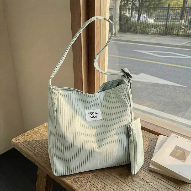 

New Striped Canvas Shoulder Bag Women Large Capacity Fashionable and Versatile Commuting Bag Casual and Simple Crossbody Bag