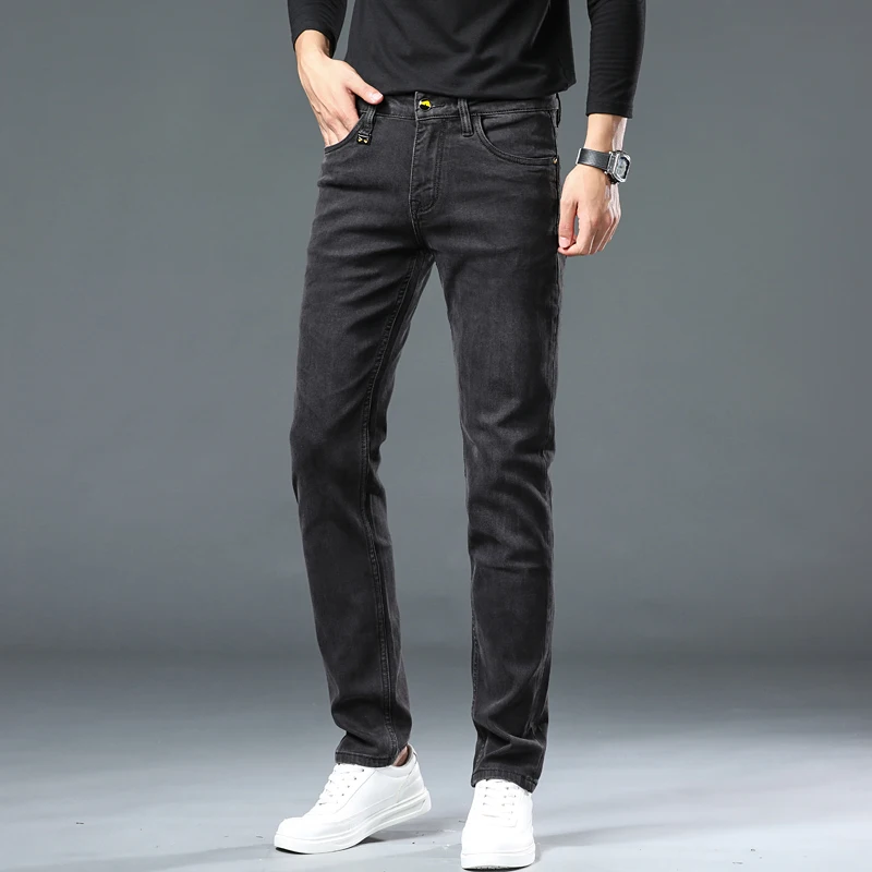 High-end Korean version of the black and gray pocket printed jeans tide men's gang handsome Slim versatile thin stretch pants