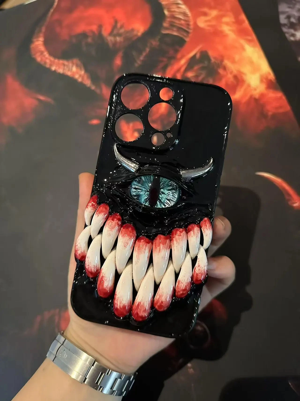 3D glowing teeth and cat eyes Decoden monster phone case for iPhone 7, 8, 11, 12, 13, 14, 15, 16 Pro Max. A creepy phone case.