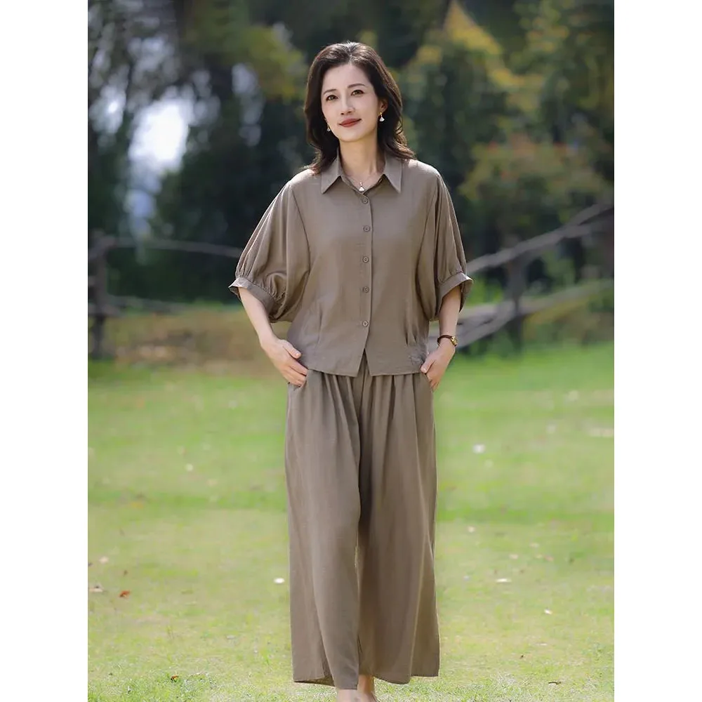 

Fashionable Mom Set Women's 2025 Summer New Style Loose Age reducing Slimming Folded Loose Solid Color Two Piece Commuter Set