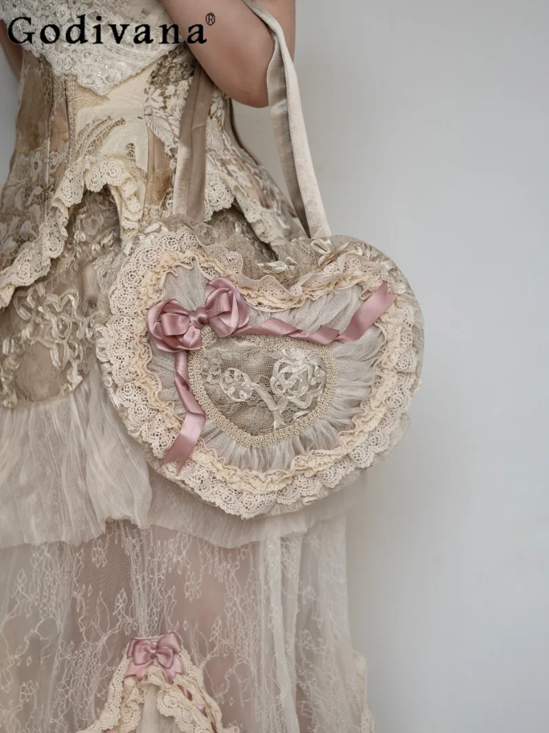 

Японская оригинальная элегантная женская сумка в стиле ретро в стиле Лолиты с сердечком, милая милая кукла с бантом, кружевная сумка на плечо