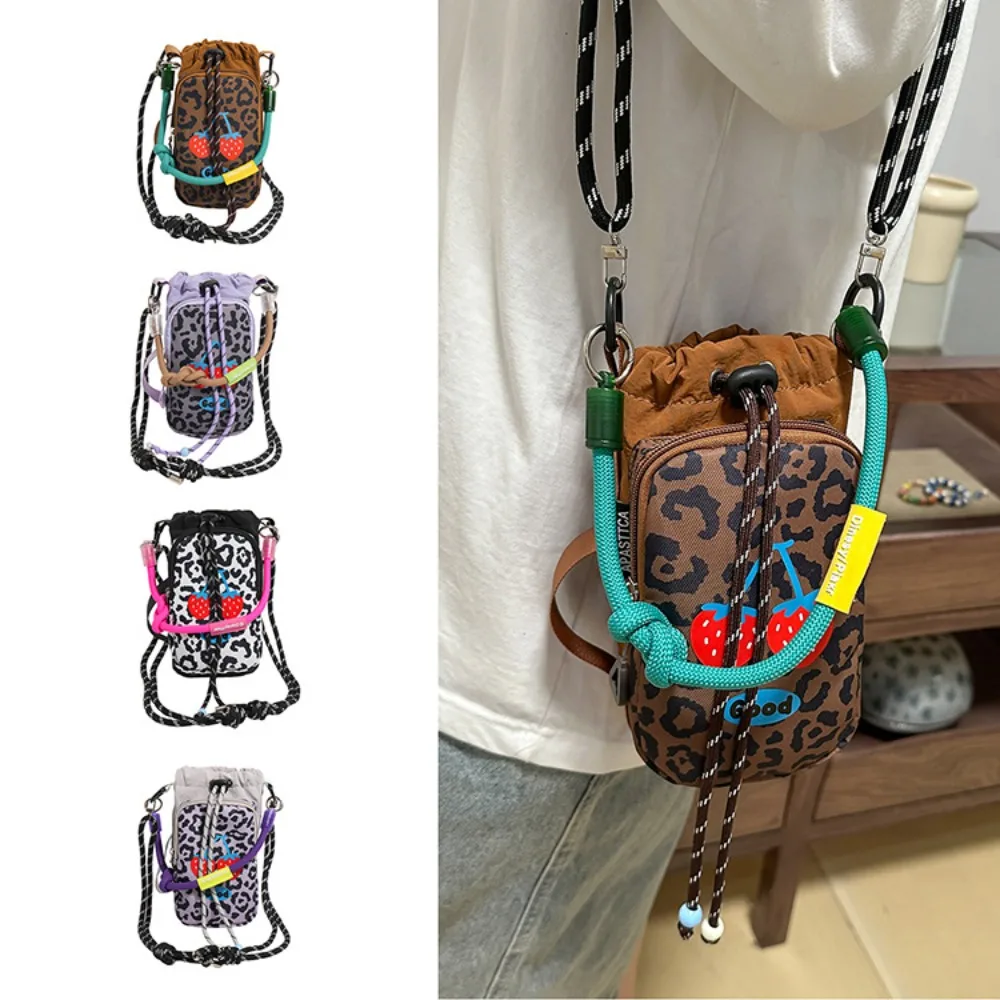 Nylon fabric lightweight color-blocking crossbody bag, outdoor sports rope drawstring, waterproof single-shoulder small bag