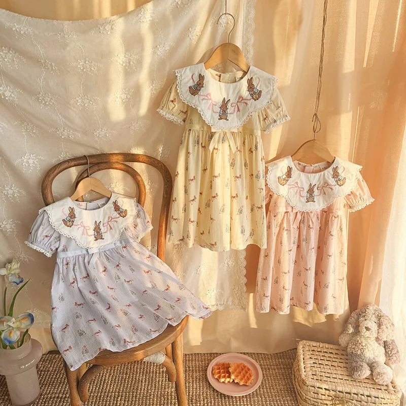 Party Dress Korean Children's Cartoon Embroidered Plaid Dress Lace Collar Bubble Sleeve Summer 2026 Collection Girls' Dress