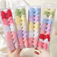 10 Uds gran oferta 4 estilos conjunto con rizador de lazos para el cabello niñas pequeñas horquillas con lazos nuevos sombreros para niños accesorios para el cabello de regalo