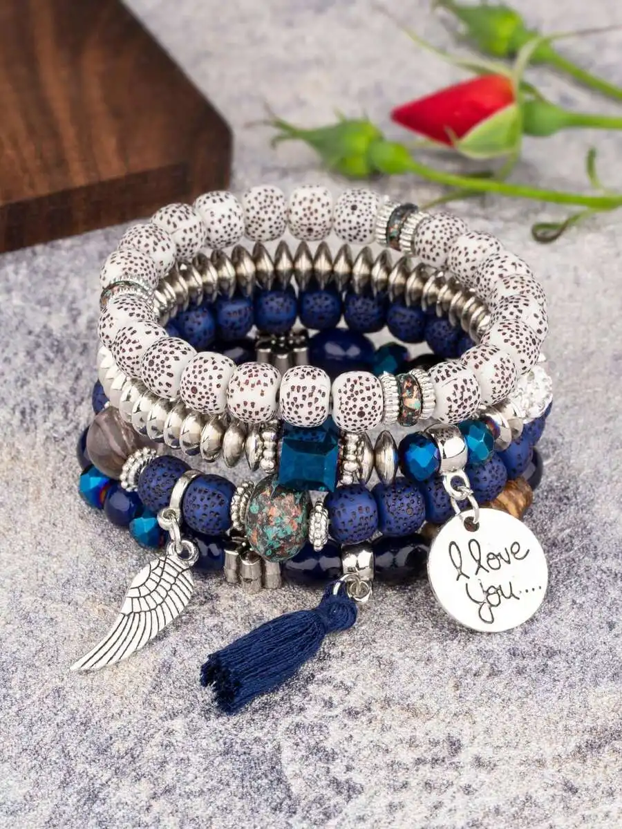 4-Piece Boho Elastic Stack Bracelet Set With Speckled Wood, Blue Lava Beads, Silver Wing, Tassel And Handwritten I Love You