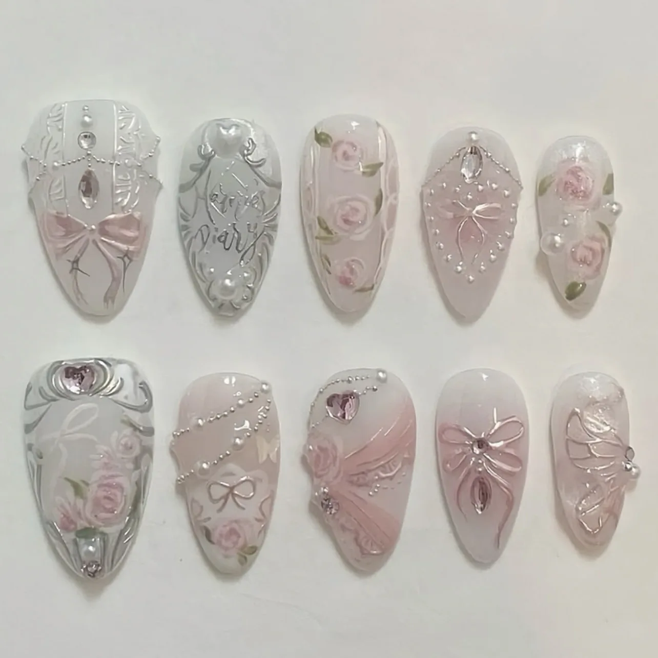 

24pcs Wearable False Nail Sweet Pink Flower Nails Sets Press on Blush Bow Design Almond Fake Nails Tips Pearl Diamond Manicure