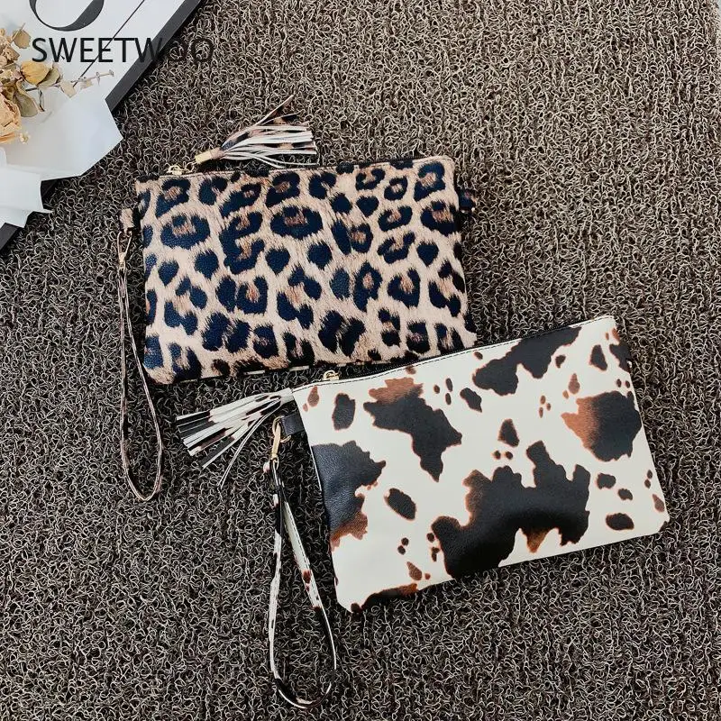 Borsa da polso geometrica con stampa di mucca leopardata in pelle PU borsa portaoggetti per telefono cellulare con moneta pochette da pranzo da donna