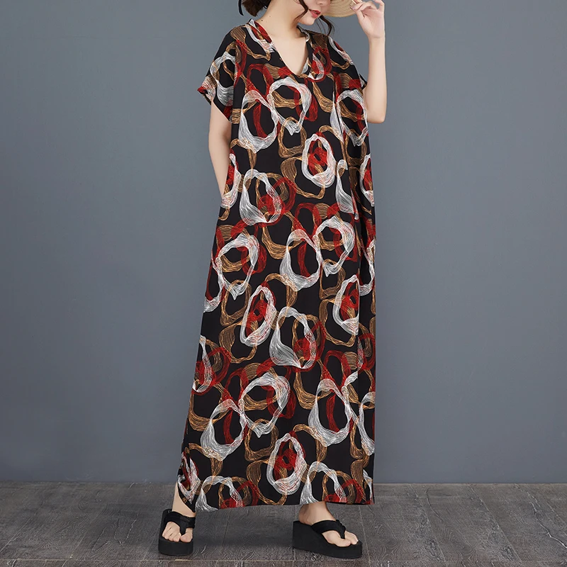 Gaun katun sutra longgar model batwing dengan kerah V, motif print, untuk wanita, cocok untuk liburan musim panas, dengan lengan panjang lurus.