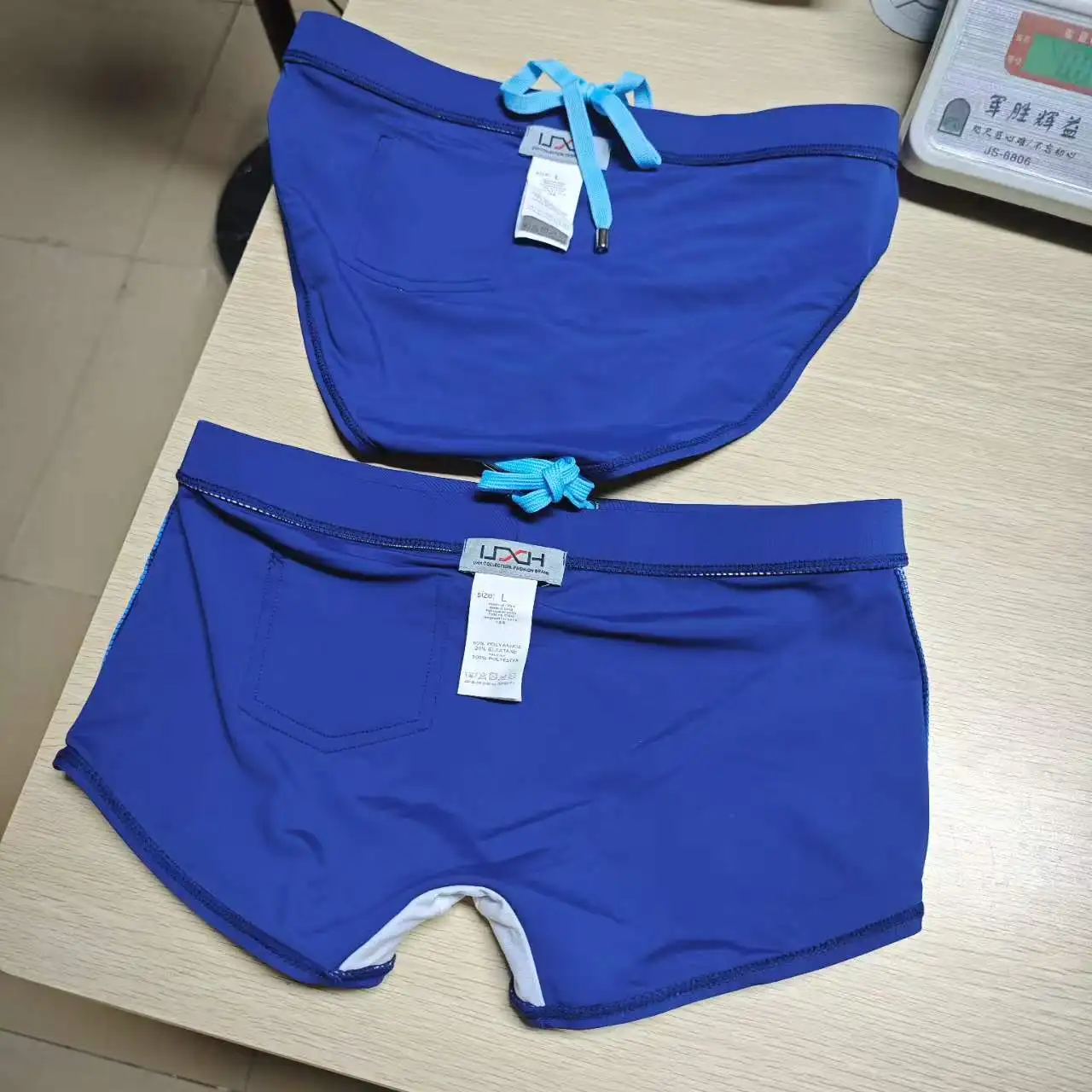 2026Original fashion European foreign trade fashion color bar elements triangular beach swimming trunks simple UXH041-377