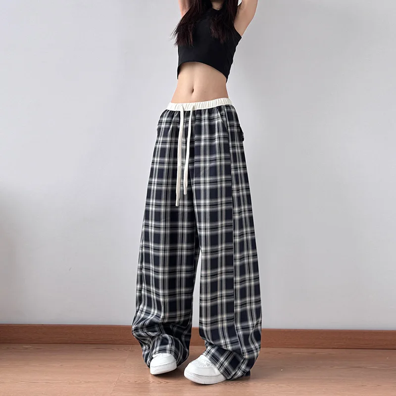 سراويل كسول ريترو ستريت منقوشة للنساء 2025 سراويل غير رسمية منقوشة جديدة فضفاضة مستقيمة باللونين الأبيض والأسود