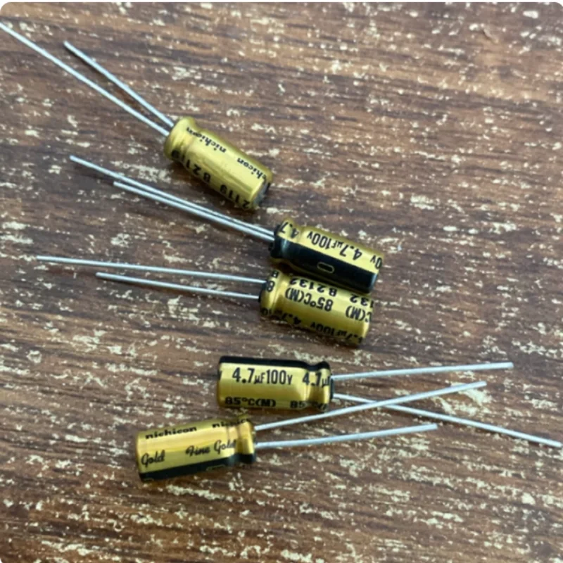 10PCS-100PCS  4.7UF 100V Japanese Nichicon capacitor 100V4.7UF 5 * 11 FG fine gold copper feet