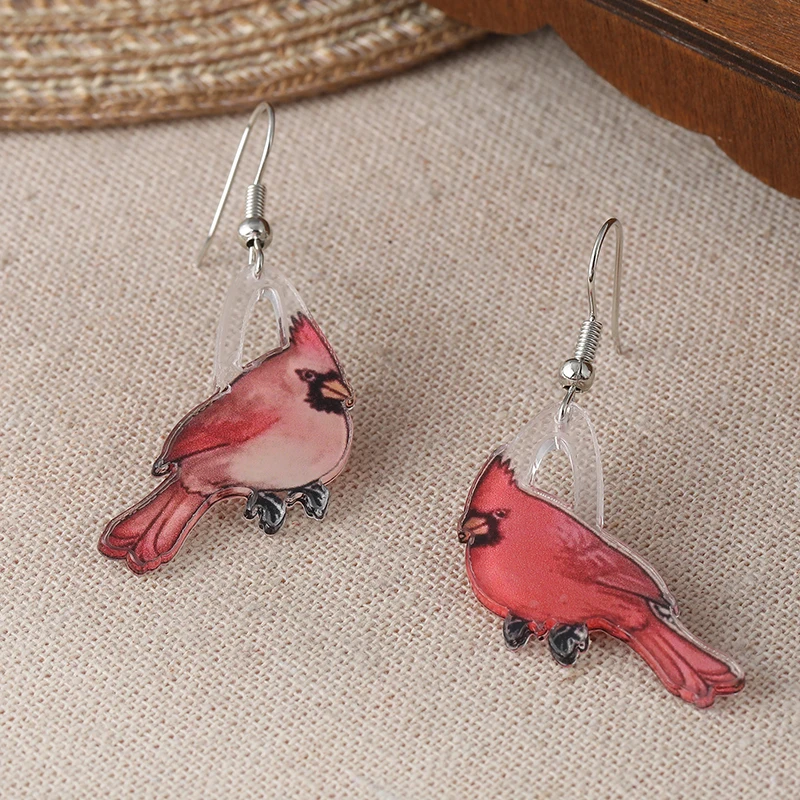 The simple design of red Hummingbird metal craft earrings is suitable for women to wear for holiday gifts or banquets with anima