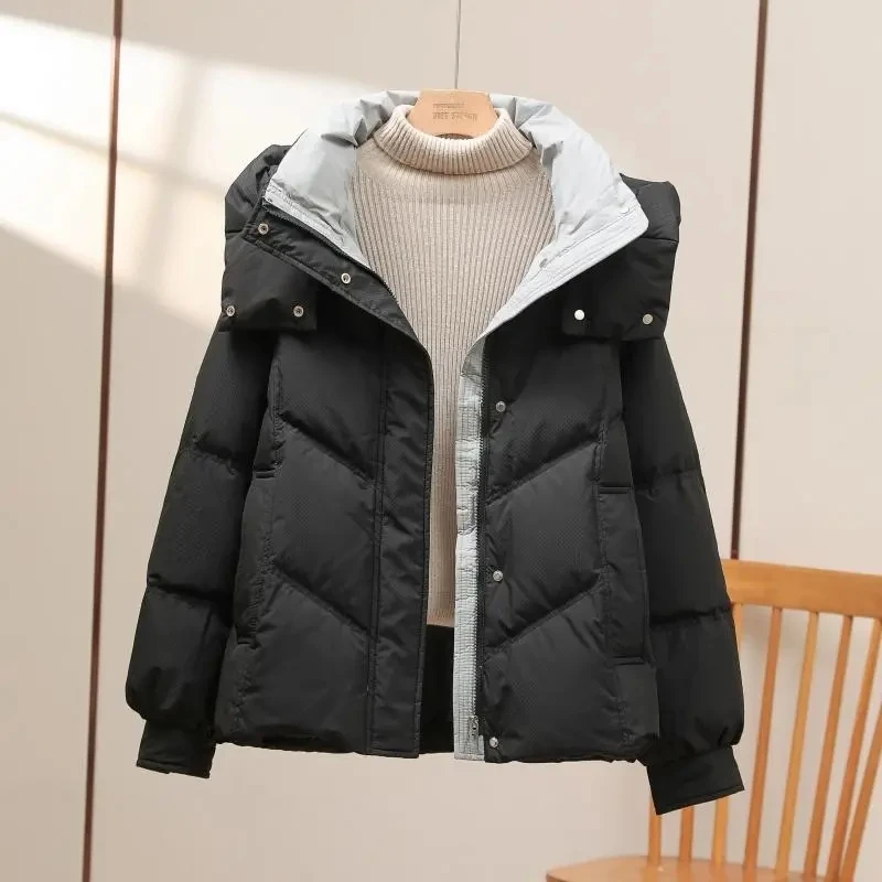 Chaqueta de algodón bloqueada de Color para mujer, nueva versión coreana, abrigo de invierno grueso y holgado, Parka cálida con capucha para mujer 2025