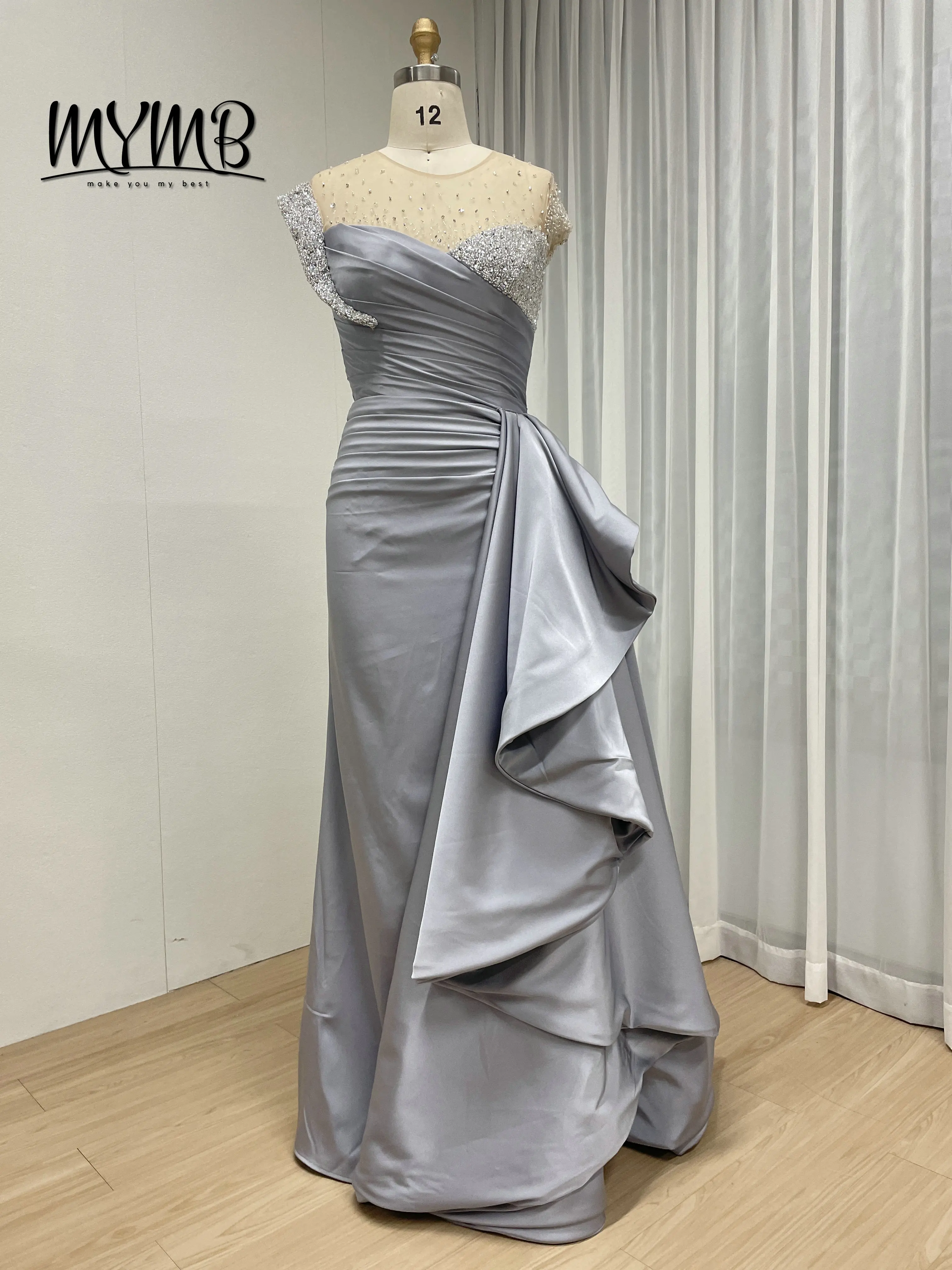 MYMB Designer Silver Satin Evening Dresses Sheer Beaded Neck Ruched Slim Fit Mermaid Gown With Statement Ruffle for Prom MB40453